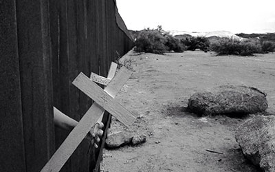 A historic photo of a cemetery at the U.S.-Mexico border.
