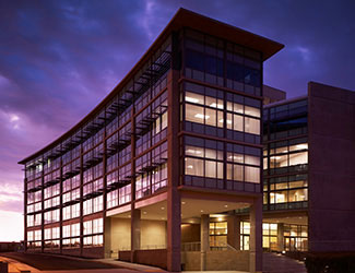 Medical Education building at night at UC Irvine School of Medicine in Irvine, California.