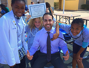 Long Beach elementary school students cheer complete of a course in medical education awareness offered by UC Irvine physicians with Doctors for Diversity.